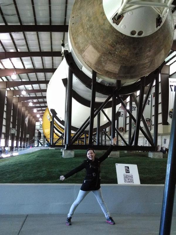 Kristina Stemler standing under a rocket